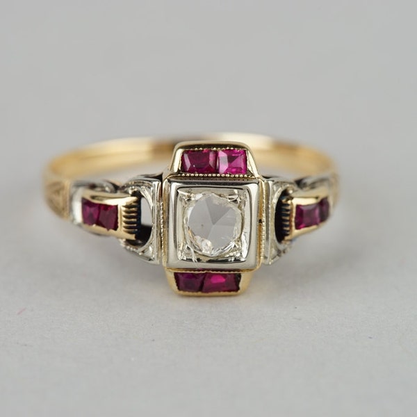 Distinctive Victorian solitaire diamond and ruby buckle ring