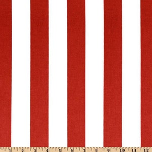 May include: Red and white striped fabric with a repeating pattern. The fabric is 12 inches wide.