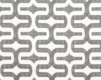 May include: A white and gray geometric pattern with a repeating design of interlocking curves.