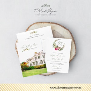 May include: Wedding stationery set featuring a watercolor illustration of a house, floral wreath, and elegant script. The set includes an invitation, RSVP card, and envelope, all on a wooden slice. The website address www.alacartepaperie.com is visible.