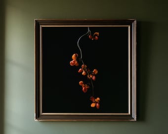 May include: A square framed wall art piece featuring a dark brown wooden frame with gold inner detailing. The artwork displays a single thin, dark branch with small, vibrant orange-red seed pods centered against a solid black background.