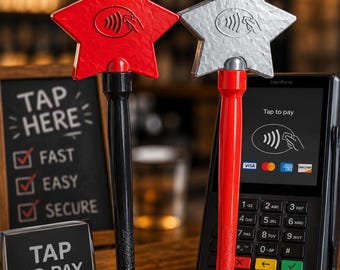 May include: Two star-shaped contactless payment wands, one red with a black handle and one silver with a red handle, each featuring a contactless payment icon. They are positioned next to a payment terminal and signs that read TAP HERE and TAP TO PAY.