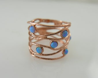 Anillo de ópalo de oro rosa. Anillo ópalo. Anillo de oro con ópalo. Anillo ancho. Anillo ancho. Anillo ancho de ópalo. Anillo de oro ondulado. Anillo de ópalo ondulado. Joyas de ópalo. Regalo para