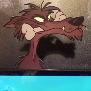 May include: A cartoon wolf with a menacing expression, its mouth open and a bone held in its teeth. The wolf is a dark purple color with a light purple bone. The background is a dark gray with a grainy texture.