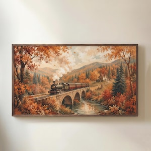 May include: A rectangular wall art print featuring a steam locomotive crossing a stone arch bridge over a river. The scene is set in an autumn forest with vibrant orange and red foliage, rolling mountains, and a small house in the distance.