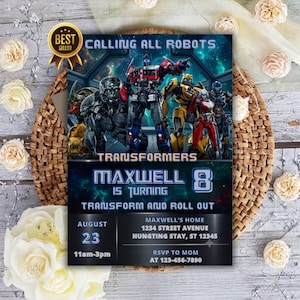 May include: A rectangular birthday invitation card featuring Transformers characters with the text Calling All Robots, Maxwell is Turning 8, Transform and Roll Out, August 23, 11am-3pm, Maxwell's Home, 1234 Street Avenue, Hungting Stay, ST 12345, RSVP to Mom 123-456-7890.