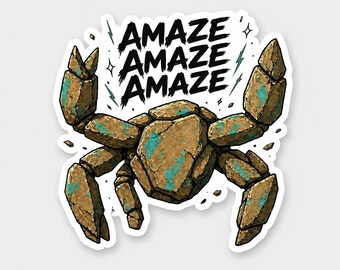 May include: A die-cut sticker featuring a crab constructed from brown and teal textured rock segments. Above the crab, the word "AMAZE" is printed three times in a bold, black, hand-drawn font, accompanied by small lightning bolt and star icons.