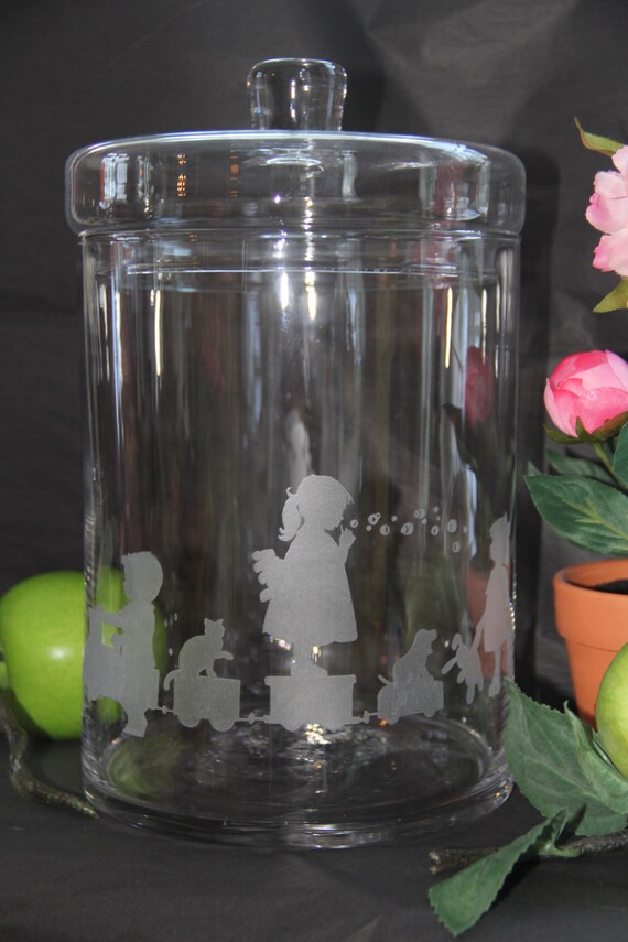 Items similar to Hand etched glass container with children design on Etsy