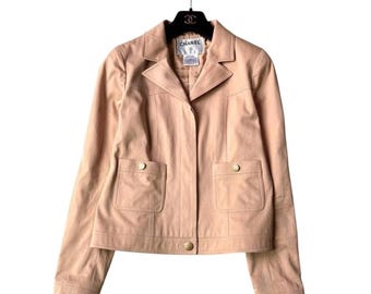 Chaqueta Chanel de algodón entallada con botones Coco y forro de seda, talla 42.