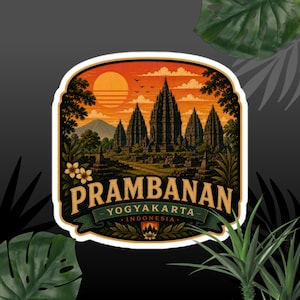 May include: A rectangular sticker with rounded corners featuring an illustration of the Prambanan temple complex in Indonesia at sunset. The text PRAMBANAN YOGYAKARTA INDONESIA is printed in large beige letters over a dark green banner.