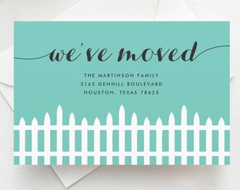 May include: A turquoise blue card with the text "we've moved" in a cursive font. The card also includes the text "The Martinson Family, 3165 Genhill Boulevard, Houston, Texas 78625" and a white picket fence graphic.