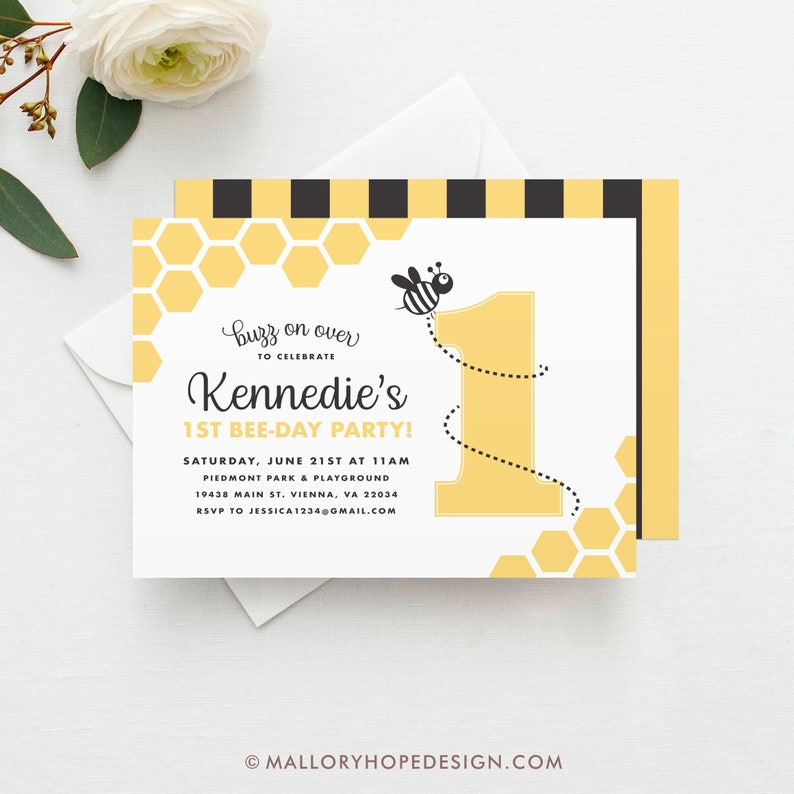 May include: A yellow and black bee-themed first birthday party invitation with a honeycomb pattern and a cartoon bee flying over the number one. The invitation reads "Buzz on over to celebrate Kennedie's 1st Bee-Day Party!" with the date, time, location, and RSVP information.