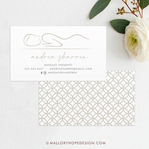 May include: White business card with a simple line drawing of a person lying down. The text "andrea sharren" is written in cursive below the drawing. The text "Massage Therapist" is written below the name, followed by a phone number and email address. The text "massagebyandrea" is written below the email address with a Facebook and Instagram icon.