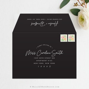 May include: Black envelope with white text. The text reads: "&bull; KINDLY DELIVER TO &bull; Miss Caroline Smith 1239 20TH STREET NW APARTMENT #14C NEW YORK, NEW YORK 10005 Amelia + Bradford 354 HARPER DRIVE NEW YORK, NY 10003".