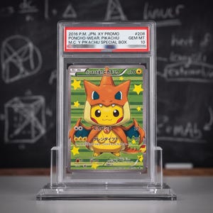 May include: A graded 2016 P.M. JPN. XY Promo #208 Poncho-Wear Pikachu M.C. Y Pikachu Special Box trading card in a clear plastic slab. The card features a yellow Pikachu wearing a Charizard-themed orange poncho against a green background with stars.