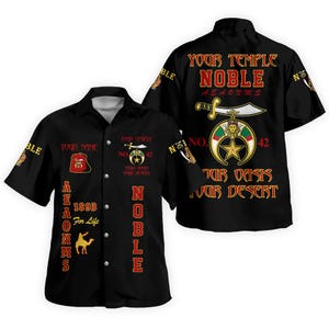 May include: A black short-sleeved button-down shirt featuring red and gold graphics. The front displays text including YOUR NAME, 1893 For Life, and A.E.A.O.N.M.S. The back features YOUR TEMPLE NOBLE, A.E.A.O.N.M.S., NO. 42, and YOUR OASIS YOUR DESERT.