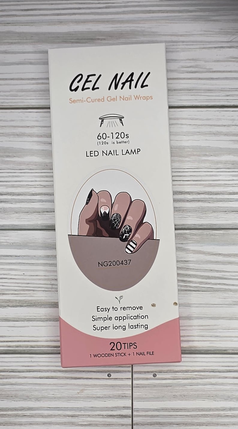 May include: A white box of semi-cured gel nail wraps with the text "GEL NAIL" and "LED NAIL LAMP". The box features an illustration of manicured nails and the text "Easy to remove, Simple application, Super long lasting".