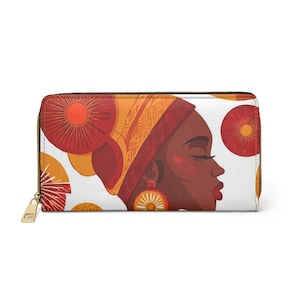 May include: A rectangular zip-around wallet featuring a white background with a repeating pattern of red and orange circular motifs. The front displays a profile illustration of a person with dark skin wearing a patterned headwrap and earrings.