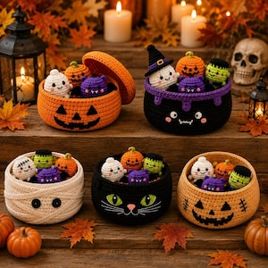 May include: A collection of five round, crocheted Halloween-themed baskets featuring designs of a jack-o'-lantern, a black cauldron, a mummy, a black cat, and a pumpkin. Each basket contains small, crocheted figures of ghosts, bats, and monsters.
