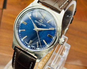 Vintage Jaeger-LeCoultre Club Herrenarmbanduhr: Restaurierte Schweizer Uhr mit Handaufzug und blauem Zifferblatt