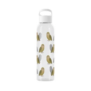 May include: A clear water bottle featuring a repeating pattern of small, olive-green owls with light-coloured faces. The bottle has a white screw-top lid with an integrated carrying loop, providing a functional design for holding beverages.