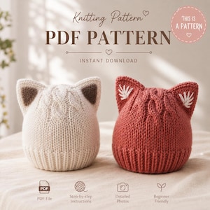 May include: Knitting Pattern PDF PATTERN INSTANT DOWNLOAD. Two knitted hats with cat ears, one cream-colored with brown inner ears and one terracotta-colored with white embroidered details. Both feature a cable knit design and ribbed brim.