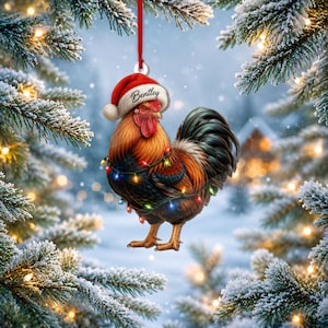 May include: A hanging Christmas ornament featuring a rooster with brown, black, and orange feathers wearing a red and white Santa hat with the name Bentley printed on the brim. The rooster is wrapped in a string of colorful, glowing holiday lights.