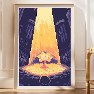 May include: A framed pixel art print featuring a yellow flower with a simple smiling face centered in a bright vertical beam of light. The background is a dark purple, textured environment with a small dark silhouette at the bottom of the frame.