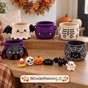 May include: A collection of five crocheted Halloween baskets and six small crocheted figures. The baskets feature designs of a bat, a purple cauldron, a skeleton, a vampire, and a spider web. The small figures include candy corn, a skull, a pumpkin, a spider, a bat, and a ghost. The text IKCrochetPatterns by IK is visible.