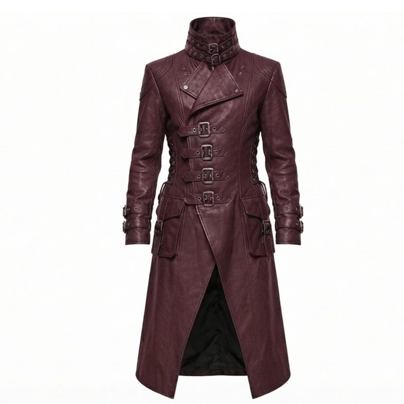 May include: A long, dark burgundy coat featuring a high collar with double buckle straps, a front closure with four horizontal buckle straps, long sleeves with double buckle cuffs, and two large flap pockets on the front with buckle details.