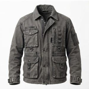 May include: A charcoal gray utility jacket featuring a fold-down collar, a front zipper closure with a snap-button placket, multiple chest and waist pockets with flaps, vertical zippered compartments, D-ring attachments, and adjustable sleeve cuffs.