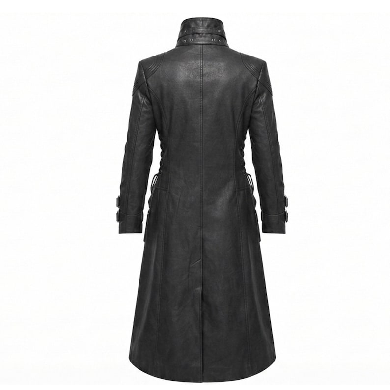 May include: A long black coat featuring a high collar with multiple metal eyelets and studs. The coat has long sleeves with adjustable buckled straps at the cuffs, a fitted bodice, and a flared skirt that extends to the mid-calf length.
