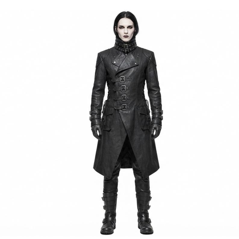May include: A black long coat featuring a high collar with a buckle strap, a front closure with four horizontal buckle straps, two large flap pockets, and long sleeves with buckled cuffs. The coat is paired with matching black trousers and boots.