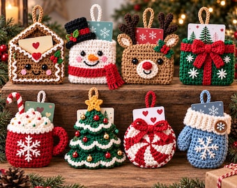 May include: A collection of eight crocheted Christmas ornaments designed as gift card holders. The set includes a gingerbread envelope, a snowman, a reindeer, a green gift box, a cocoa mug, a Christmas tree, a peppermint candy, and a blue mitten.