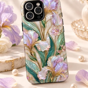 May include: A smartphone case featuring an iridescent, mother-of-pearl style finish with a detailed floral pattern of purple irises and green leaves. The design includes gold-toned accents outlining the petals and foliage against a cream background.