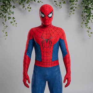 May include: A full-body Spider-Man costume featuring a vibrant red and blue color scheme with a black web pattern overlay. The suit includes a matching mask with large white eye lenses and a prominent black spider emblem centered on the chest area.