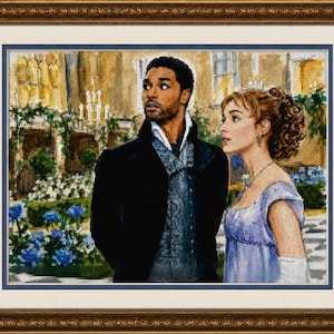 May include: A cross-stitch embroidery depicting a man in a dark coat and patterned vest standing beside a woman in a light purple dress. The scene is set in a garden with blue flowers, greenery, and a building with lit chandeliers in the background.