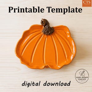May include: A digital printable template featuring a graphic of an orange pumpkin-shaped dish with a brown stem. The text reads Printable Template, CTS, and hand-drawn template digital download. This is a flat graphic design for crafting purposes.