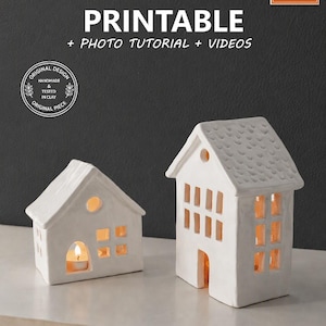 May include: Two white ceramic house-shaped candle holders with cut-out windows and doors. The text reads PRINTABLE + PHOTO TUTORIAL + VIDEOS and CTS CLAY TEMPLATE STUDIO. A small lit tea light candle is visible inside the shorter house structure.