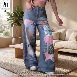 May include: High-waisted blue denim jeans featuring wide legs and a patchwork design. The patches consist of various fabric patterns including pink plaid, blue floral, white lace, and dark grey floral prints stitched onto the front of the legs.