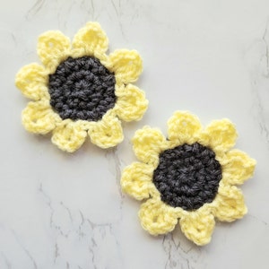 Light yellow sunflower car coasters.