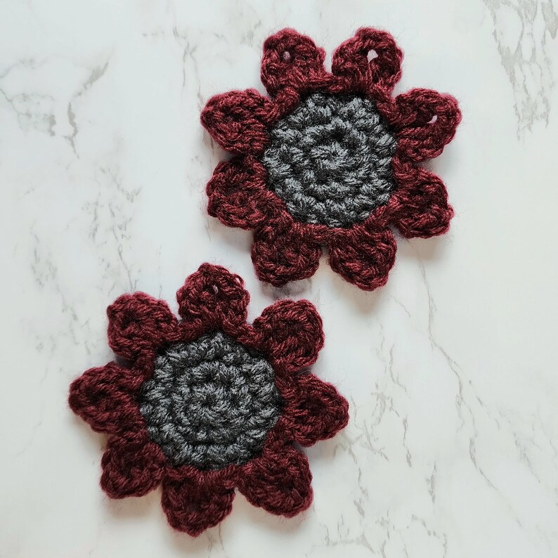 Burgundy red sunflower car coasters.