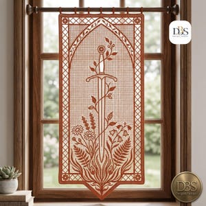 May include: A rectangular, rust-coloured lace curtain panel featuring a central sword motif entwined with vines, leaves, and various flowers. The design is framed by a geometric lattice border and hangs from a rod. The logo DBS is visible.