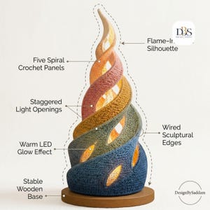 May include: A spiral-shaped lamp featuring five crochet panels in a gradient of blue, green, yellow, and orange. The structure has wired sculptural edges, staggered light openings, and a warm LED glow effect, all mounted on a stable wooden base.