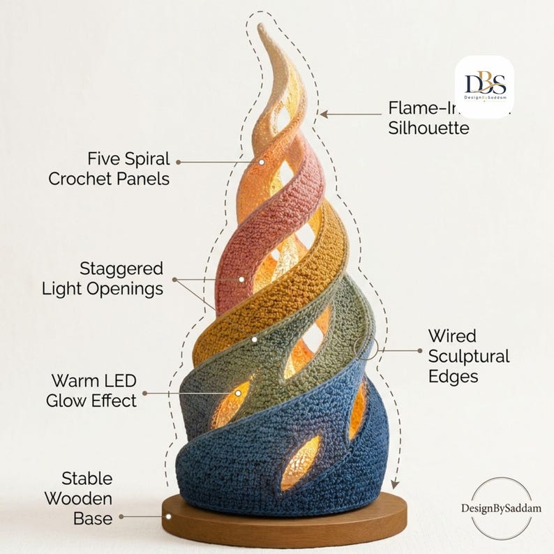 May include: A spiral-shaped lamp featuring five crochet panels in a gradient of blue, green, yellow, and orange. The structure has wired sculptural edges, staggered light openings, and a warm LED glow effect, all mounted on a stable wooden base.
