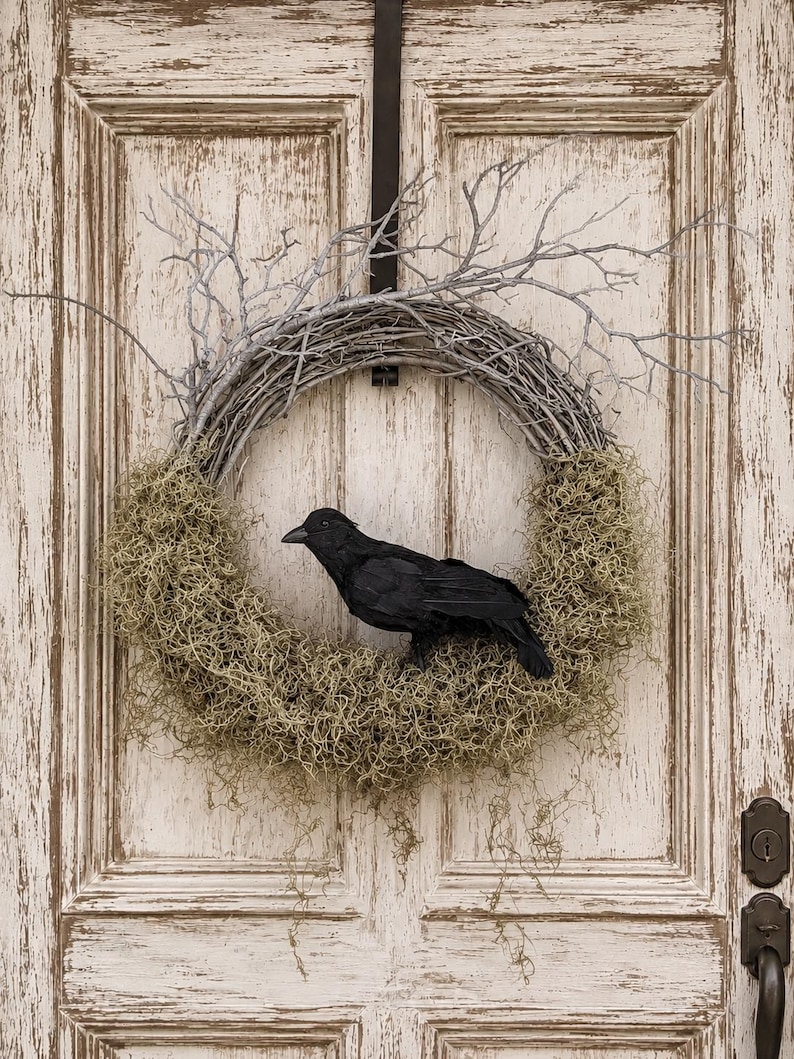 Twiggy Halloween wreath with Spanish moss and a lifelike black crow