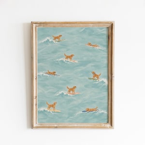 May include: A framed wall art print featuring a light blue ocean scene with multiple golden retriever dogs surfing on colourful surfboards. The dogs are depicted in various poses on the water, riding waves across the composition in a repeating pattern.