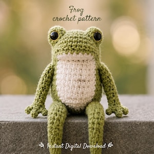May include: A crocheted frog toy with olive green yarn, a cream-colored belly, and large black plastic eyes. The text "Frog crochet pattern" and "Instant Digital Download" are visible above and below the toy, respectively.