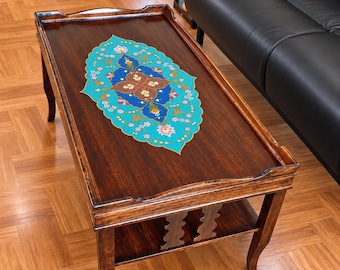 A vintage hand-painted coffee table