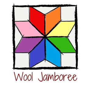 May include: A colorful star-shaped design with six points, each point a different color: red, orange, yellow, green, blue, and purple. The design is surrounded by a black outline and set against a white background. The text "Wool Jamboree" is written below the design in red.